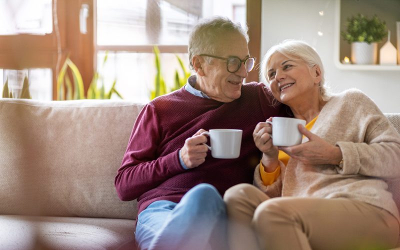 Portrait of a happy senior couple relaxing together at home